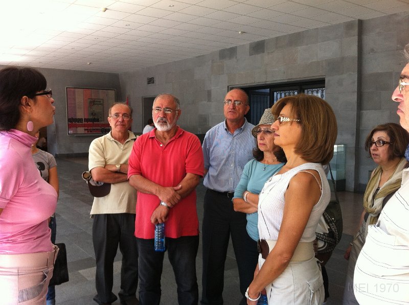 Listening to the Guide at the Genocide Museum.JPG